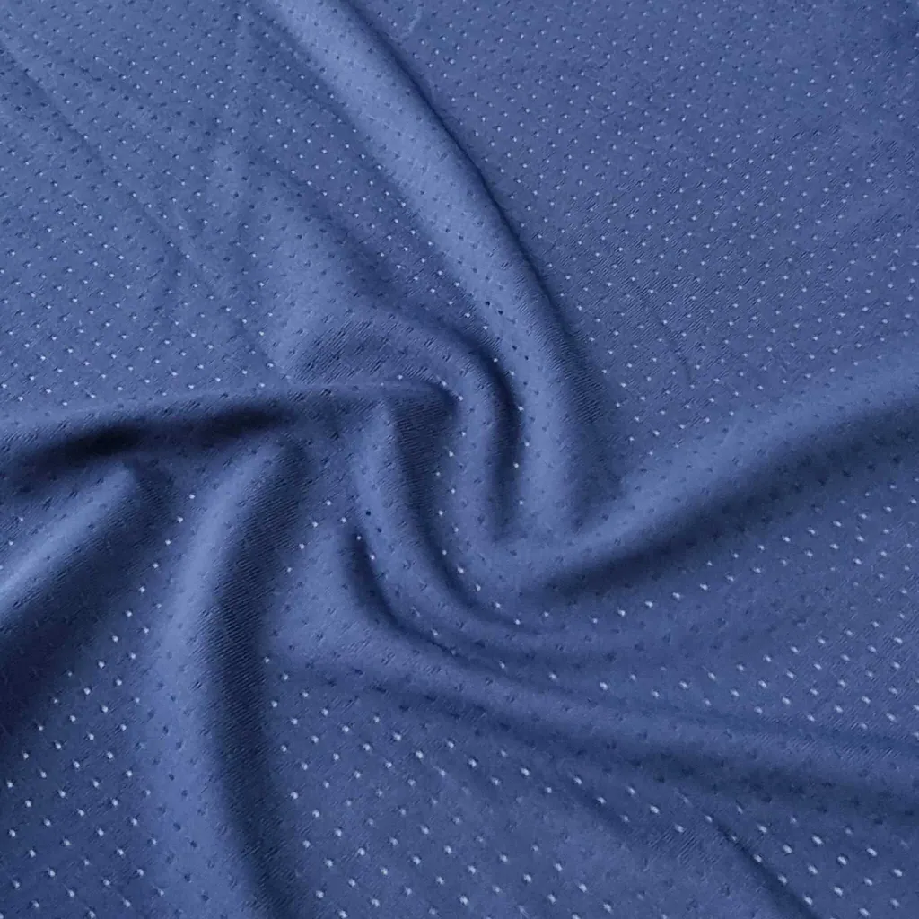 Detalle de la tela microperforada azul