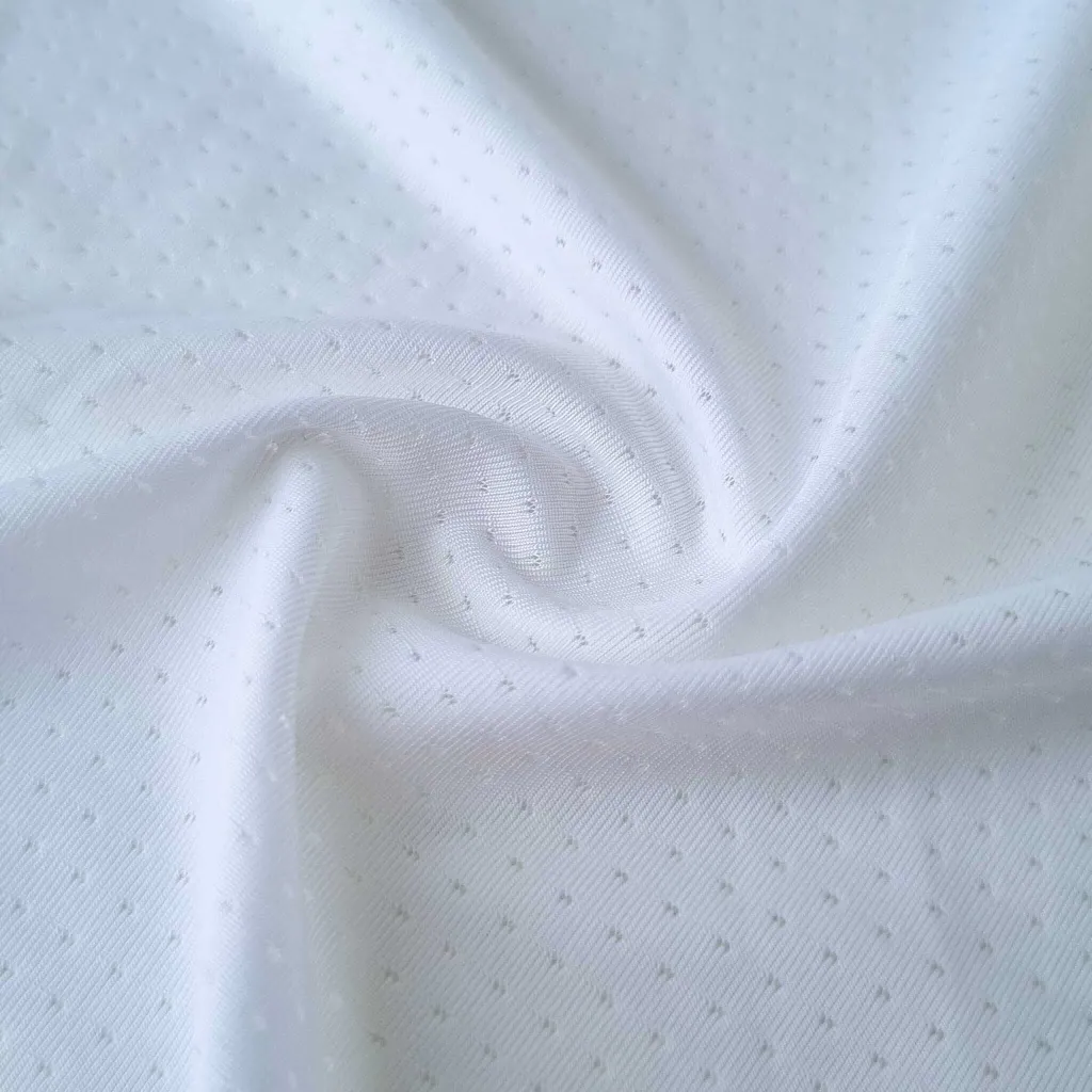 Detalle de la tela microperforada blanca